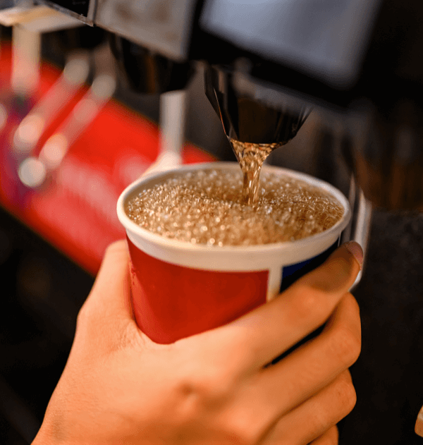 AVS Beverages replacement Pouring carbonated soda from restaurant soda machine
